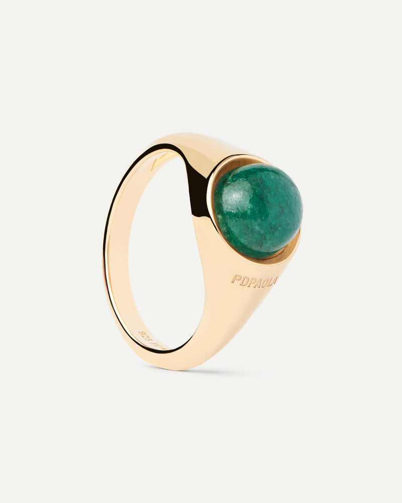 Gold-plated half sphere ring topped with an oval green gemstone