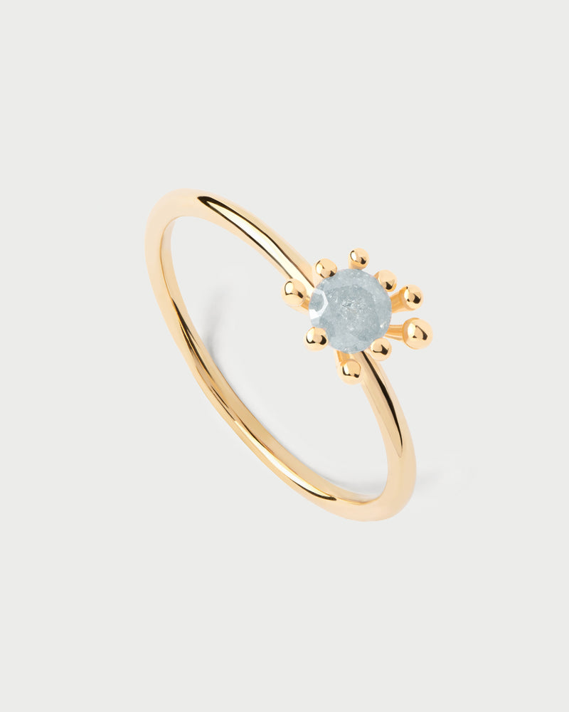 Gold-plated organic ring set with iced grey zirconia surrounded by multi-prong setting