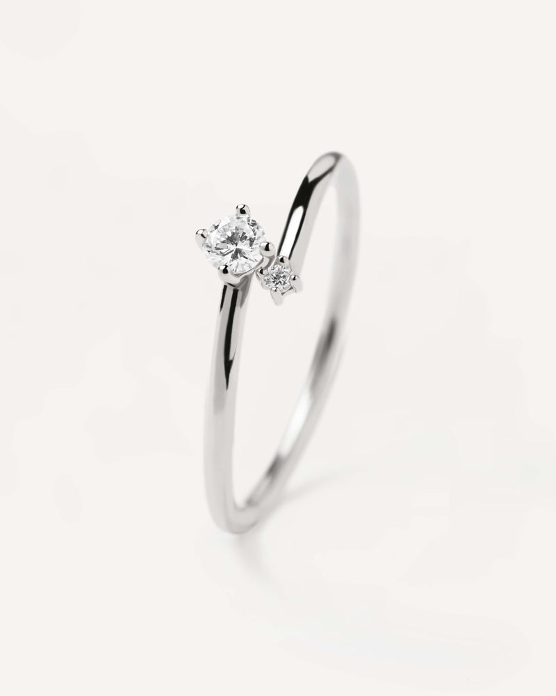 You-and-Me ring in 18K white gold with two different sizes lab-grown diamonds, making 0.11 carats