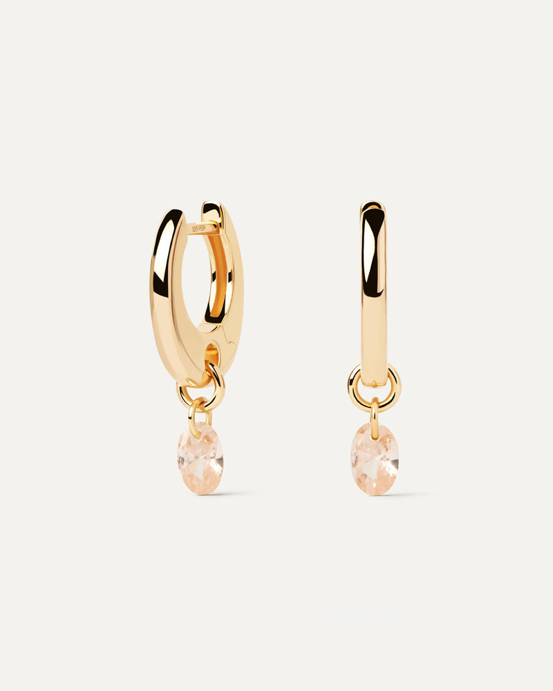 Gold-plated hoop earrings with a peach zirconia drop pendant