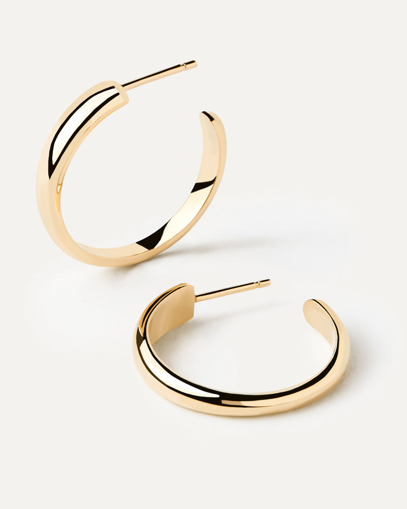 Bold open hoop earrings in solid 18K yellow gold with rounded edges