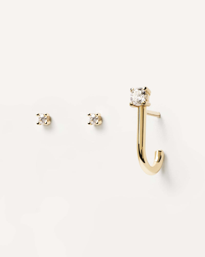 Solid yellow gold earring set with 3 individual lab-grown diamond solitaire studs, making 0.16 carats