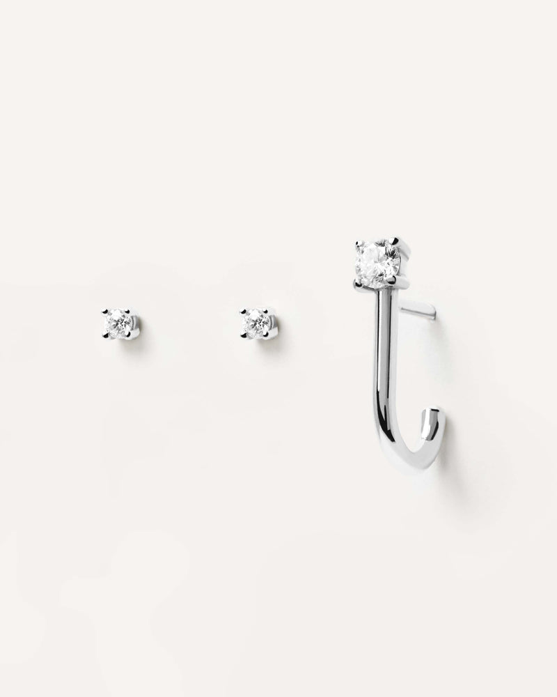 Solid white gold earring set with 3 individual lab-grown diamond solitaire studs, making 0.16 carats