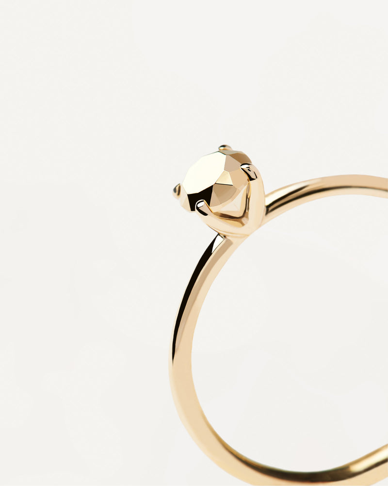Gold-plated solitaire ring with silver diamond