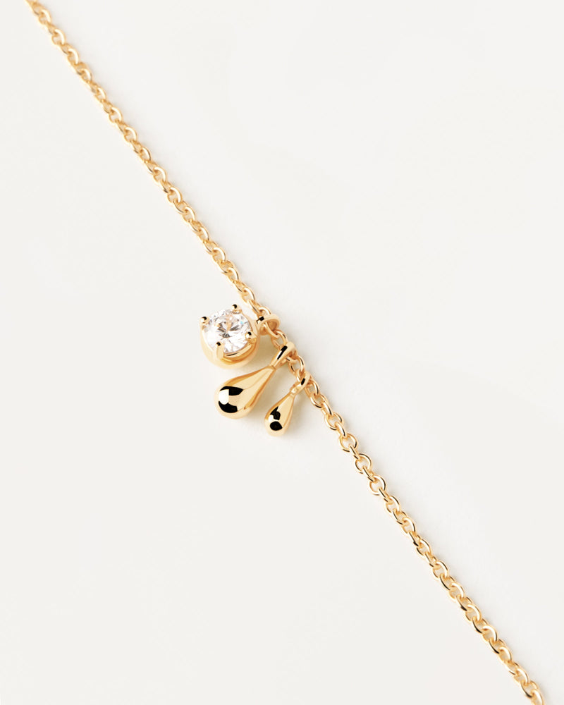 Gold-plated silver bracelet with round zirconia and two drop pendants