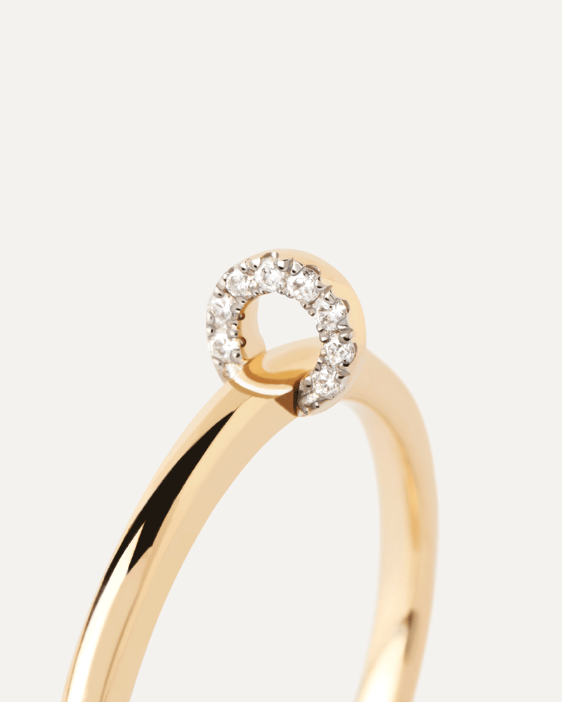 Solid yellow gold ring topped with a swinging circle set with lab-grown diamonds