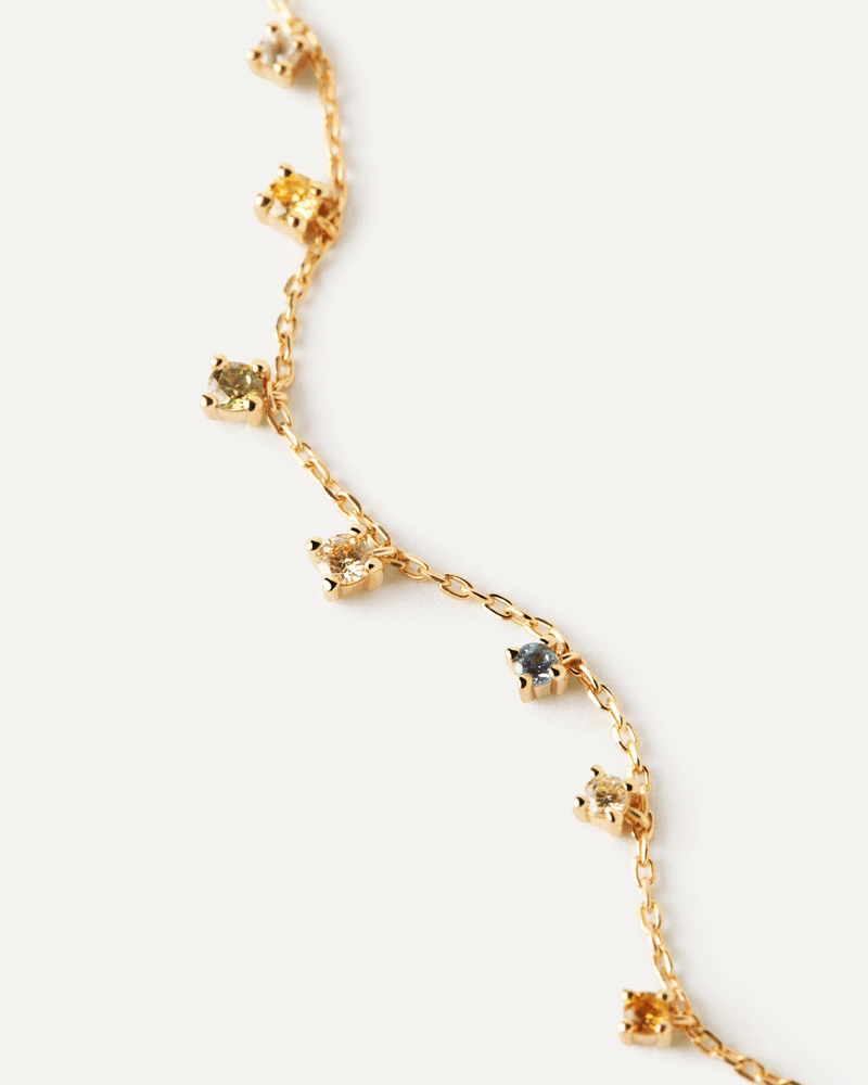 Gold-plated bracelet with eight multicolor zirconia pendants